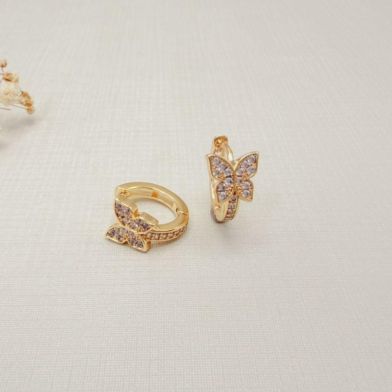 05.3139.1.O - (Tam.G) Argola circular de borboleta solitaria cravejada de borda lisa