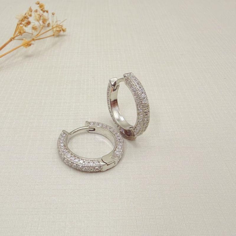 05.3141.1.B - (Tam.M) Argola circular com cravação frontal e lateral em frente e atrás