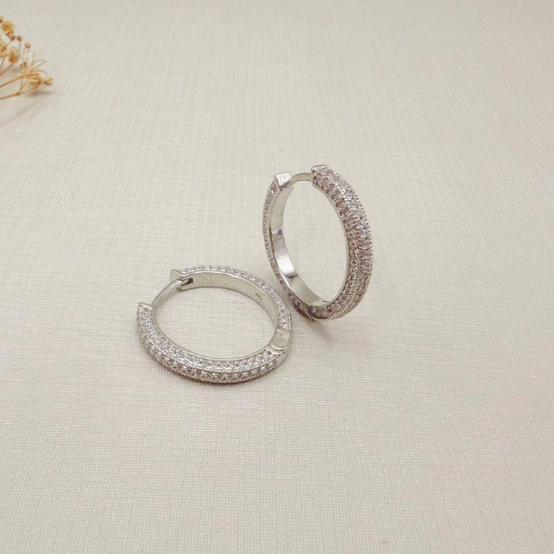 05.3142.1.B - (Tam.G) Argola circular com cravação frontal e lateral em frente e atrás