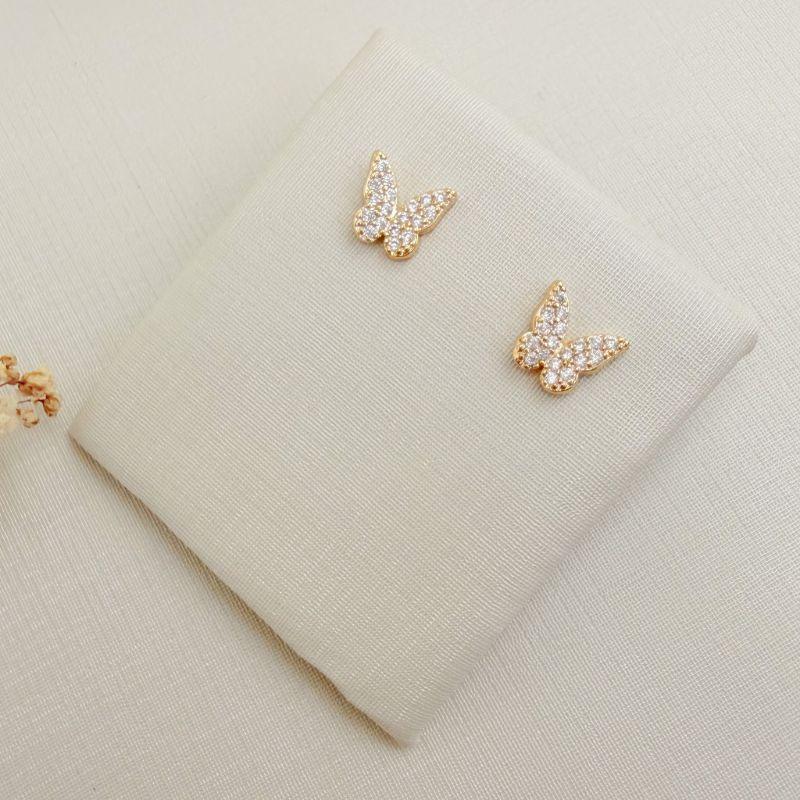 07.2857.1.O - Brinco de borboleta cravejada de borda reta