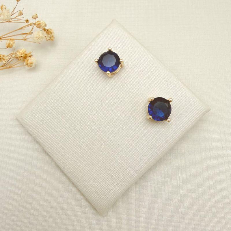 07.2866.4.O - (0,7 Tam.M) Brinco de ponto de luz circular em garras com galeria