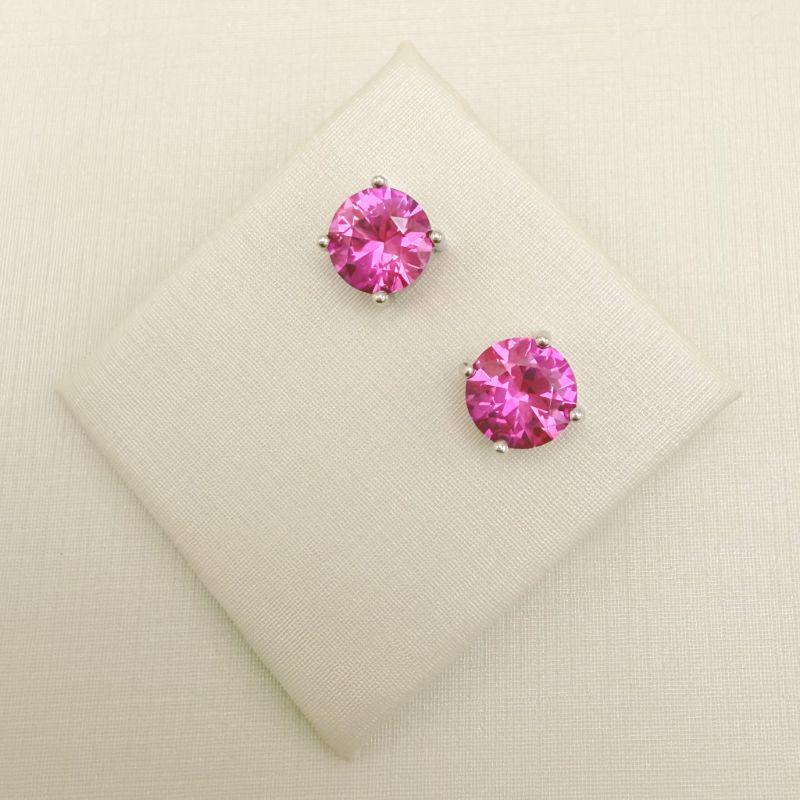 07.2867.13.B - (0,9 Tam.G) Brinco de ponto de luz circular em garras com galeria