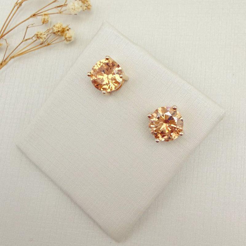 07.2867.3.O - (0,9 Tam.G) Brinco de ponto de luz circular em garras com galeria