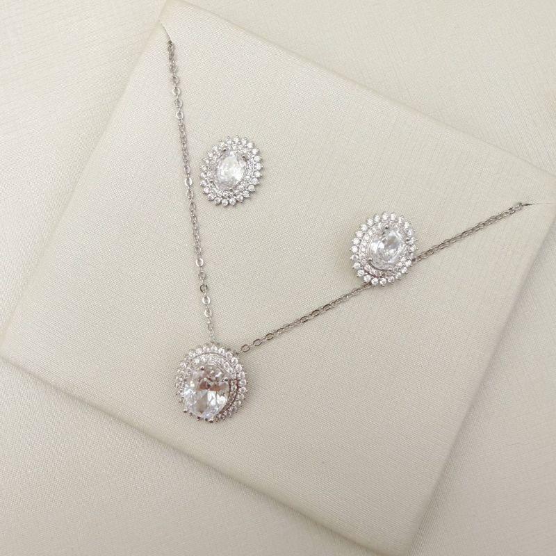 08.0630.1.B - (40) Conjunto oval com duas linhas de aura em volta