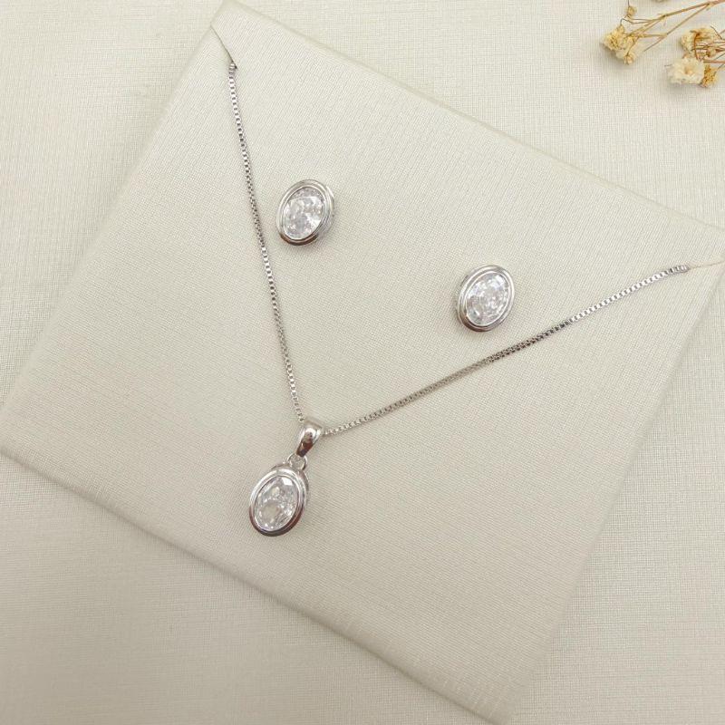 08.0632.1.B - (40) Conjunto oval em cravação gypsy com galeria