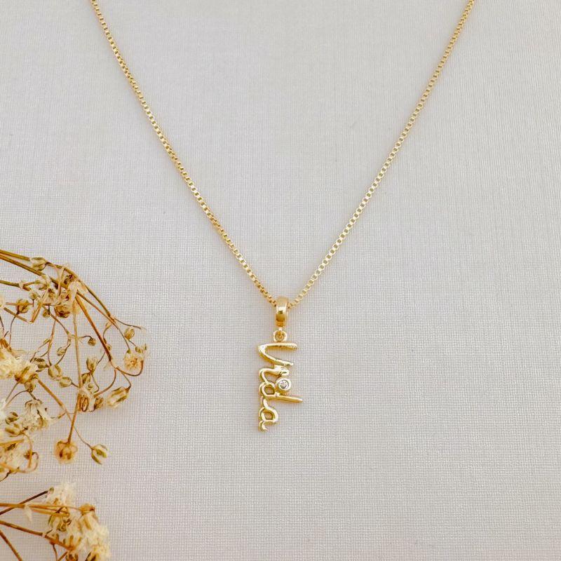 09.2382.1.O - (45) Colar com pingente escrito vida com ponto de luz