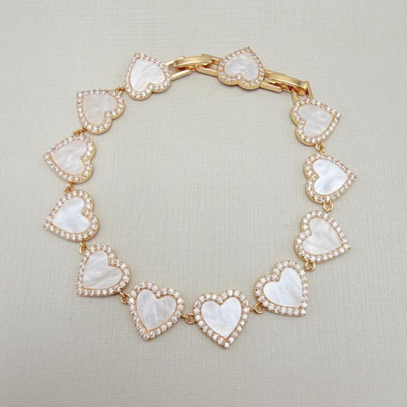 12.2285.15.O - Pulseira de corações em madre pérola com borda cravejadas