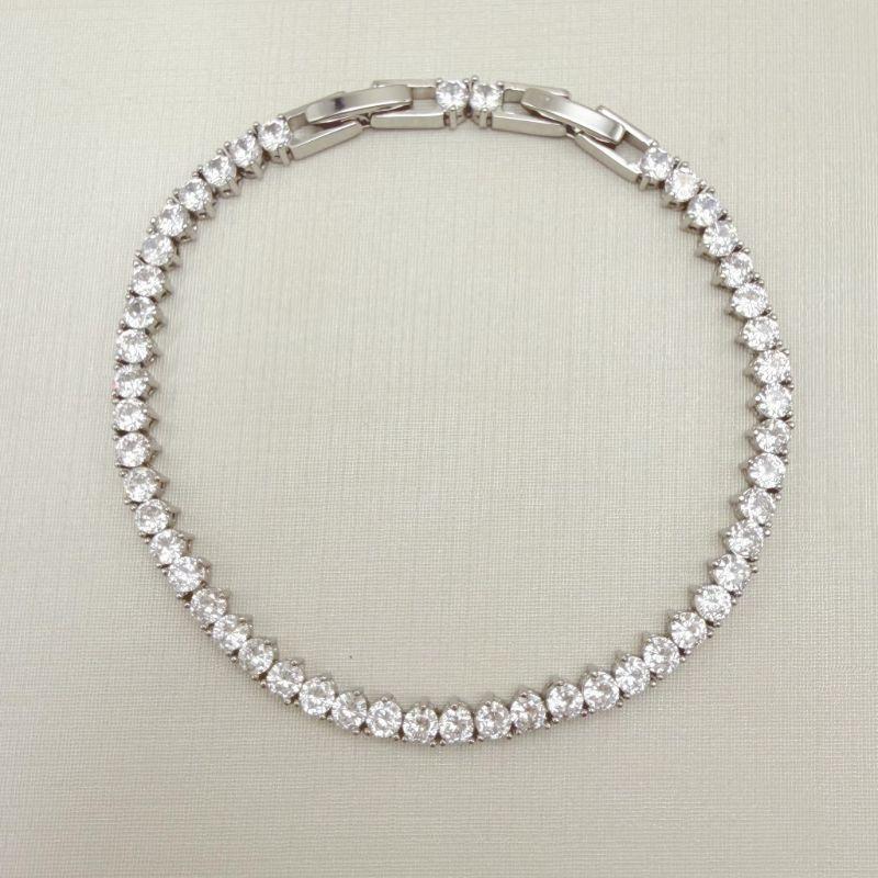 12.2287.1.B - Pulseira em riviera clássica simples com fecho relogio