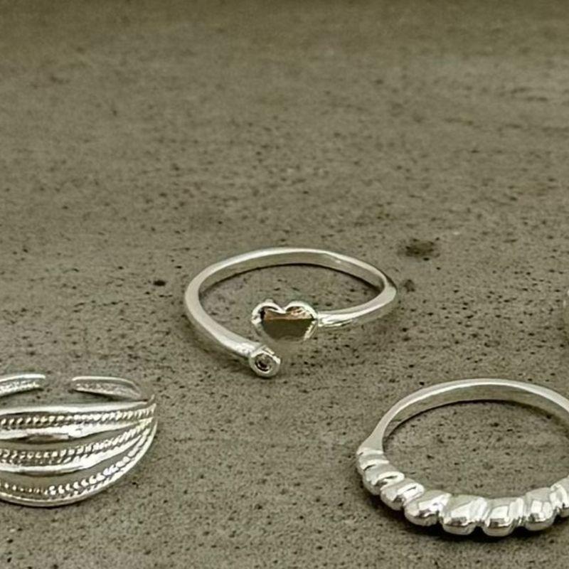 01.0200.1.S - (R) Falange pontas abertas com coração liso e pedra em ingles