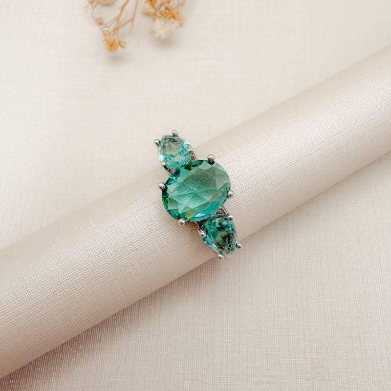 03.2556.9.B - (19) Anel solitário oval 10x8mm com uma gota em cada lado em aro liso