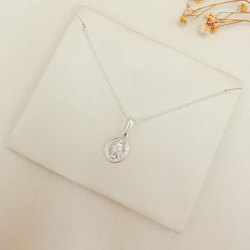 09.2464.0.S - (45) Colar de cartier com pingente oval de Virgem Maria