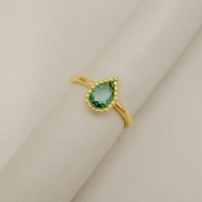 03.2488.9.O - (13) Anel solitário de gota em cravação barras em aro liso