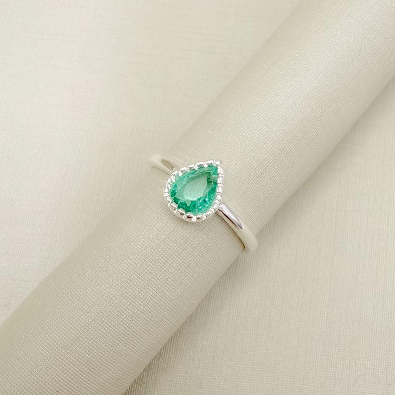 03.2488.9.S - (20) Anel solitário de gota em cravação barras em aro liso