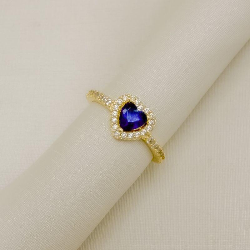 03.2573.4.O - (14) Anel solitario de formato coração com um linha de aura e aro lateral cravejado