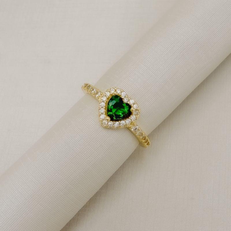 03.2573.5.O - (19) Anel solitario de formato coração com um linha de aura e aro lateral cravejado