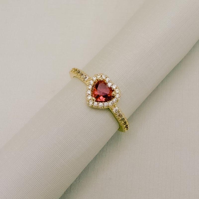 03.2573.6.O - (22) Anel solitario de formato coração com um linha de aura e aro lateral cravejado