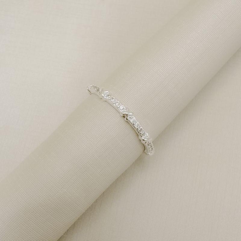 03.2578.1.S - (24) Anel estilo aparador com aro cravejado e X espaçados lisos