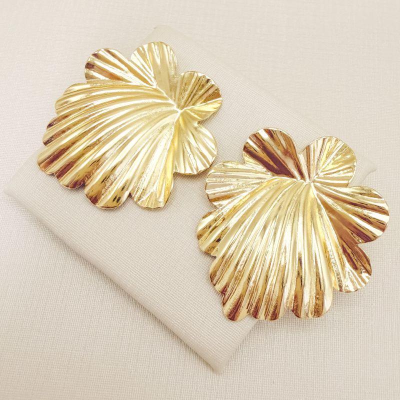 06.1360.0.O - Brinco de chapa em formato orgânico de efeito raios de sol