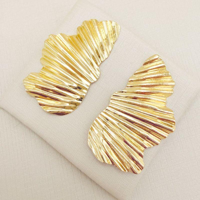 06.1364.0.O - Brinco de chapa em formato orgânico abstrato de efeito raios de sol