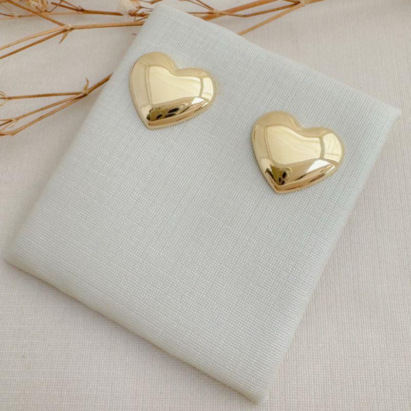 07.2755.0.O - (Tam.GG) Brinco de coração abaloado liso simples