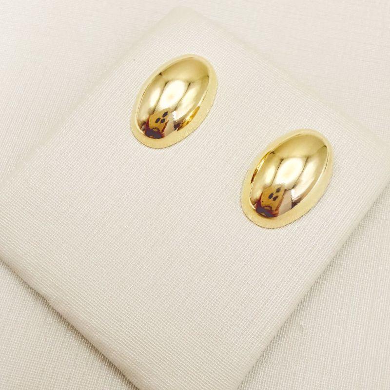 07.2882.0.O - Brinco de chapa oval convexa lisa polida