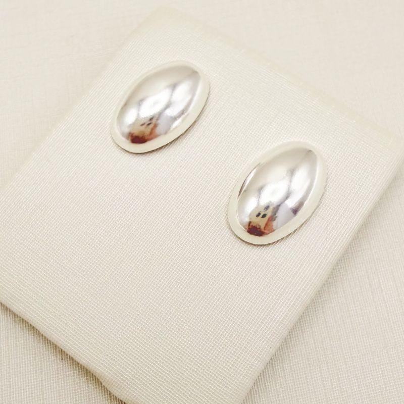 07.2882.0.S - Brinco de chapa oval convexa lisa polida