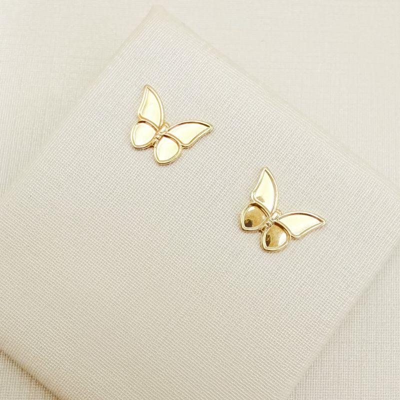 07.2883.0.O - Brinco de formato borboleta em chapa lisa com brodas lisas