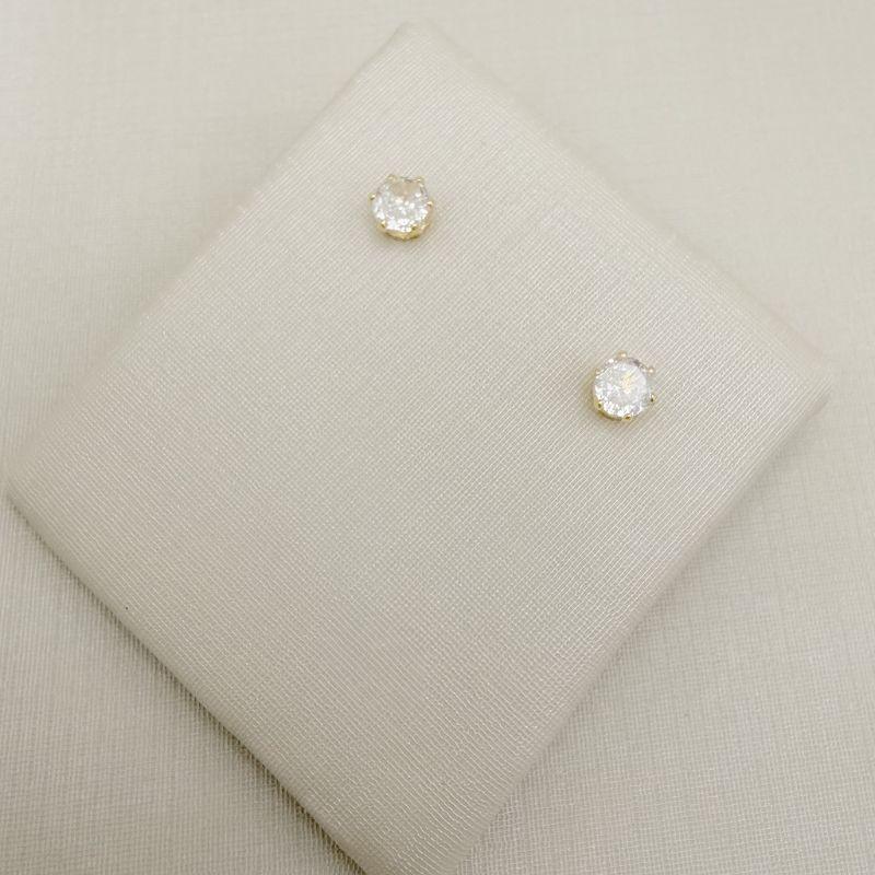 07.2884.1.O - Brinco ponto de luz em cinco garras em taça