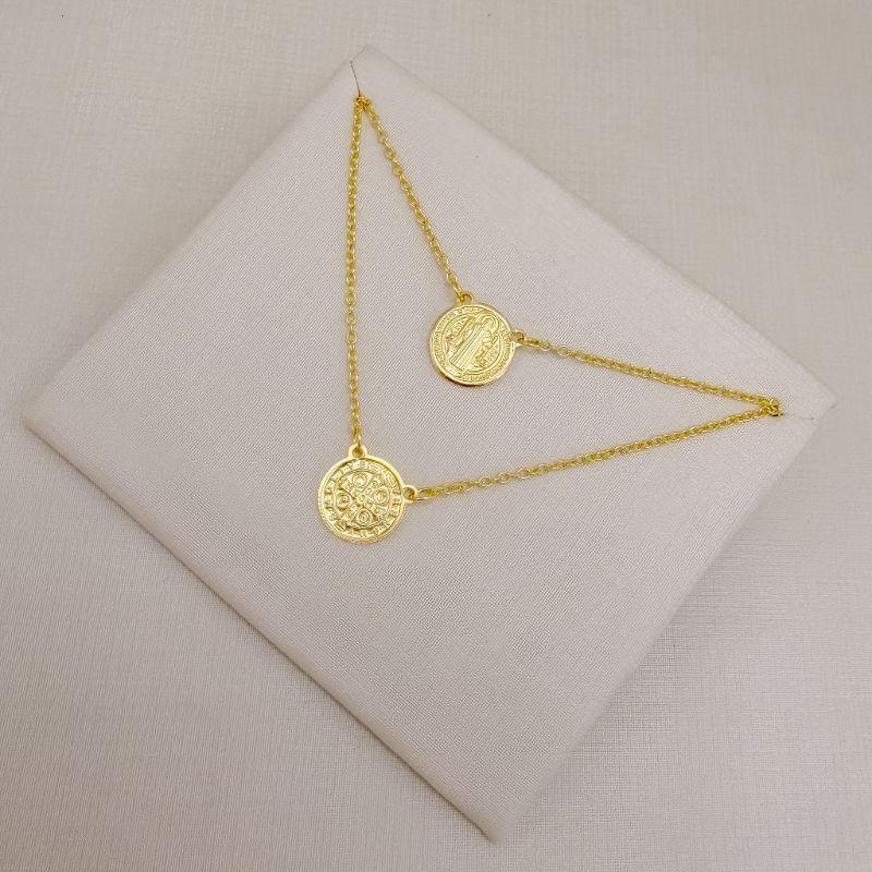 09.2061.0.O - (60) Escapulário de São Bento e moeda