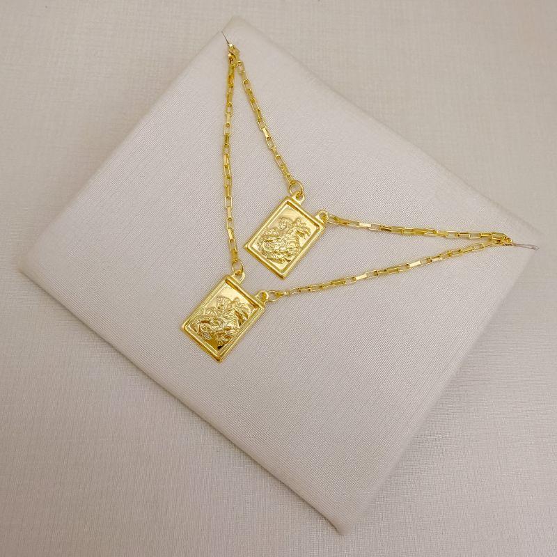 09.2062.0.O - (70) Escapulário de São Jorge em esquadro retangular liso