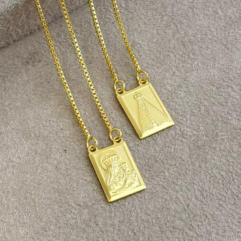 09.2063.0.O - (60) Escapulário de N. S. Aparecida. N. S. do Carmo, S. C. de Jesus Cristo e versículo pela graça sois salvos