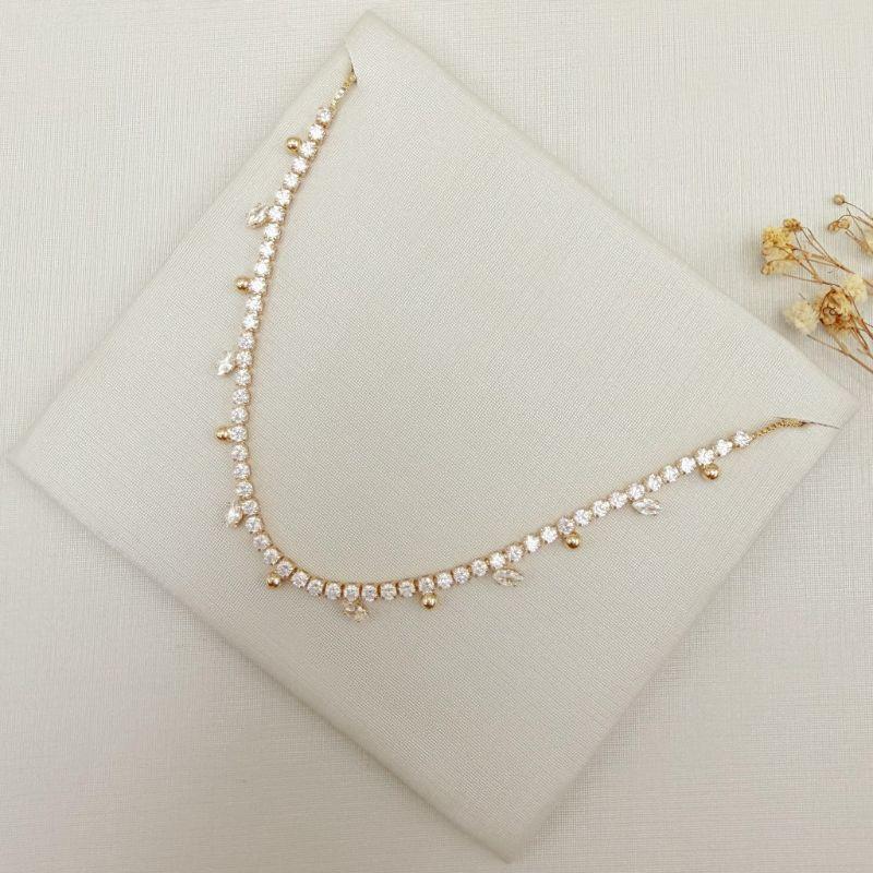 09.2447.1.O - (41) Colar riviera com bolinhas lisas e navetes espaçadas