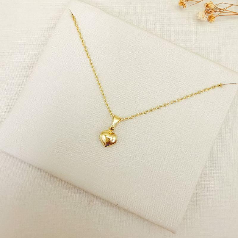 09.2463.0.O - (45) Colar de cartier com pingente coração abaloado liso