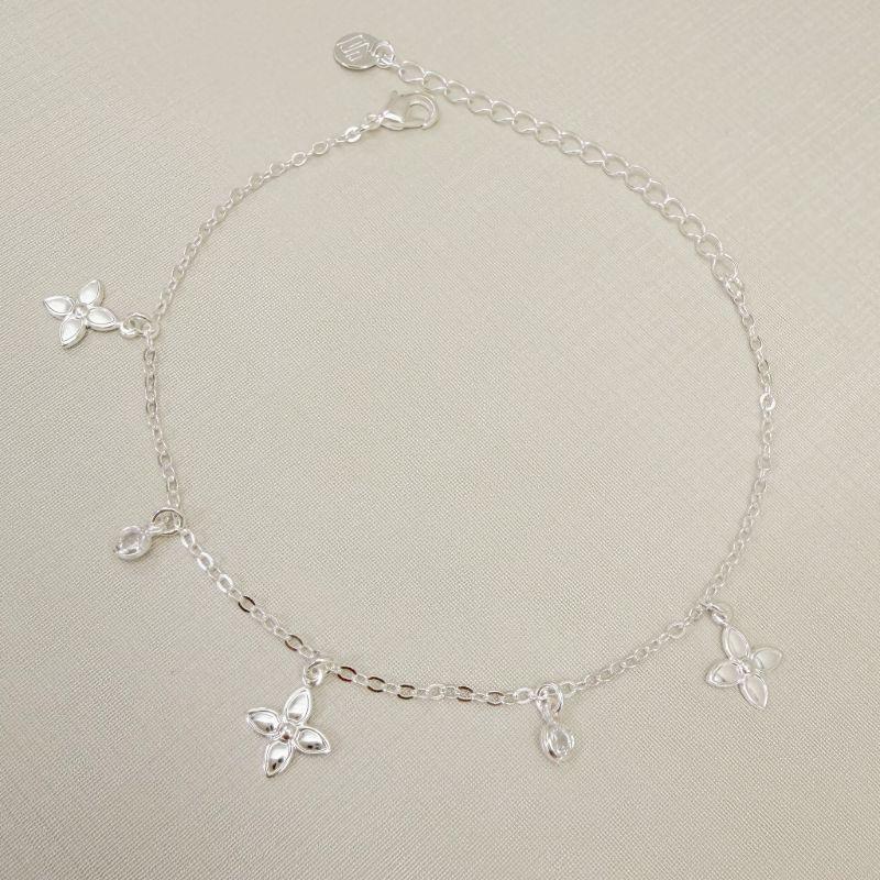 12.2301.1.S - Pulseira de elos americanos com pingente flor de quatro pétalas e pontos de luz