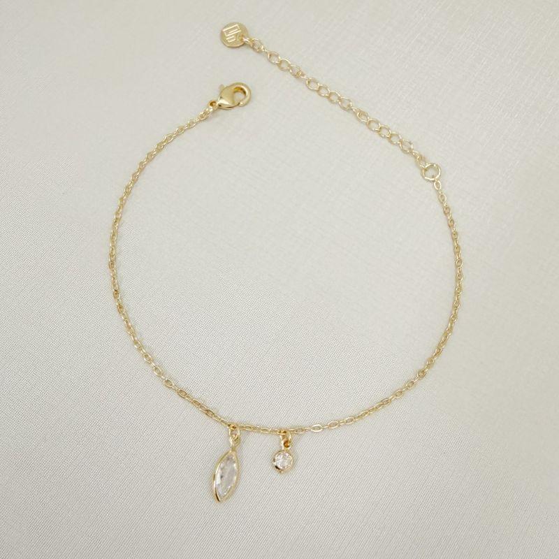 12.2302.1.O - Pulseira de elos americanos com pingente de ponto de luz em formato navete