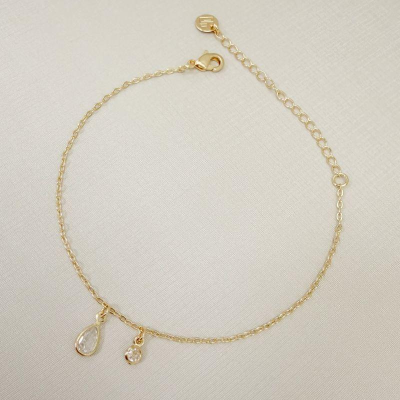 12.2303.1.O - Pulseira de elos americanos com pingente de ponto de luz em formato gota