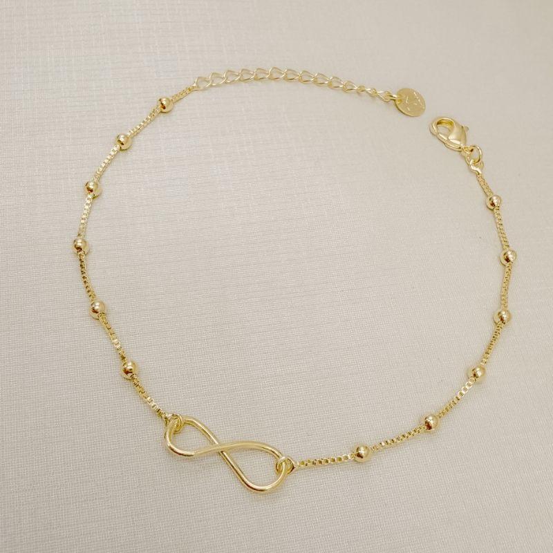 12.2307.0.O - Pulseira de veneziana com bolinhas espaçadas e infinito central liso