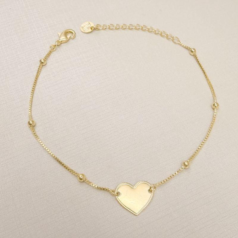 12.2308.0.O - Pulseira de veneziana com bolinhas com central de coração em placa lisa