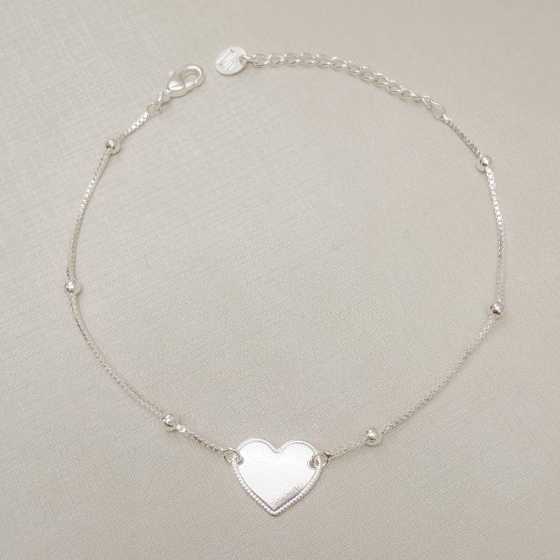 12.2308.0.S - Pulseira de veneziana com bolinhas com central de coração em placa lisa