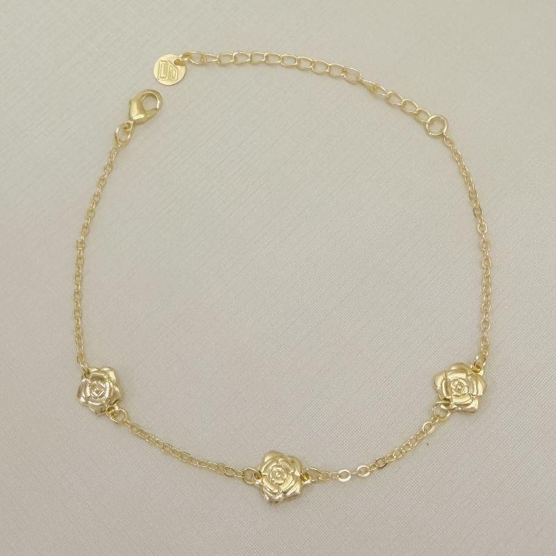 12.2320.0.O - Pulseira de elos ovais com flores em chapa desenhadas espaçadas