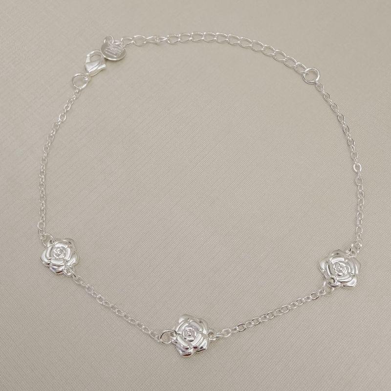 12.2320.0.S - Pulseira de elos ovais com flores em chapa desenhadas espaçadas