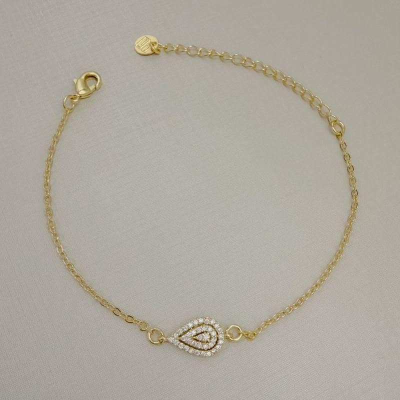 12.2329.1.O - Pulseira de elos americanos com central em gota cravejada