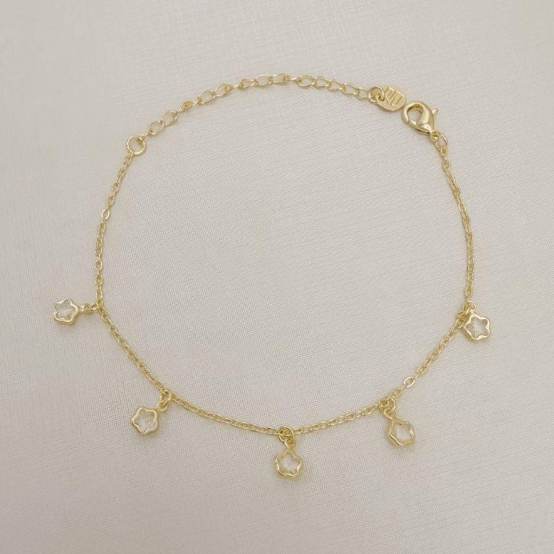 12.2337.1.O - Pulseira de elos americanos com cinco pingentes de pontos de luz em flor