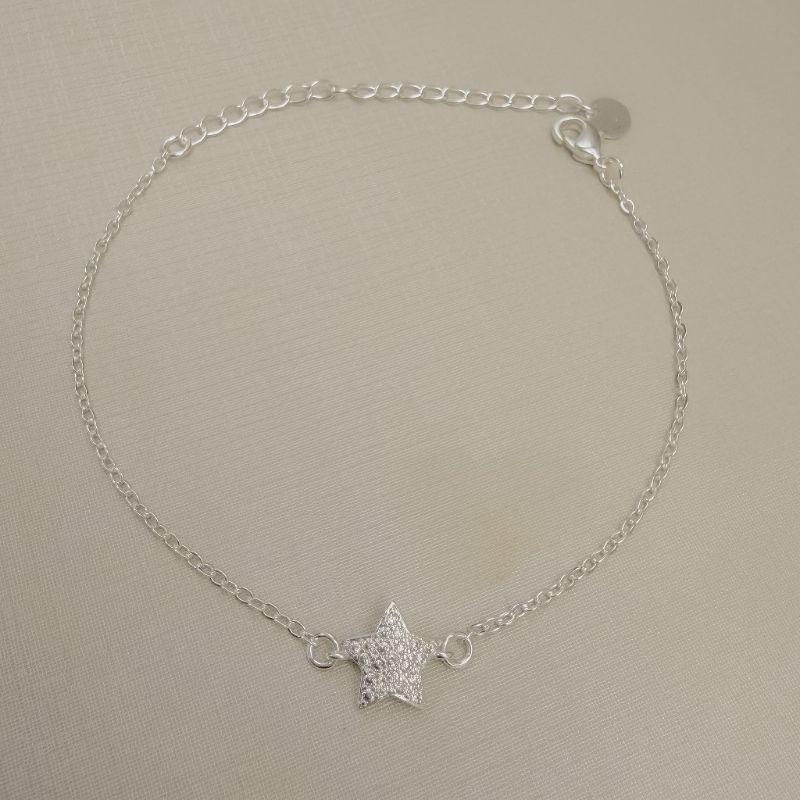 12.2342.1.S - Pulseira de elos americanos com central de estrela cravejada